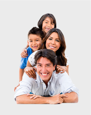 family laying on top of each other smiling